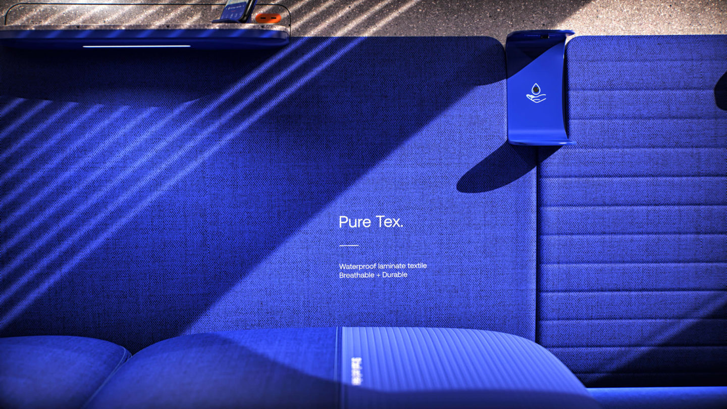 A detail of the blue seats. Printed on the fabric, we read: Pure Tex, waterproof laminate textile, breathable, durable