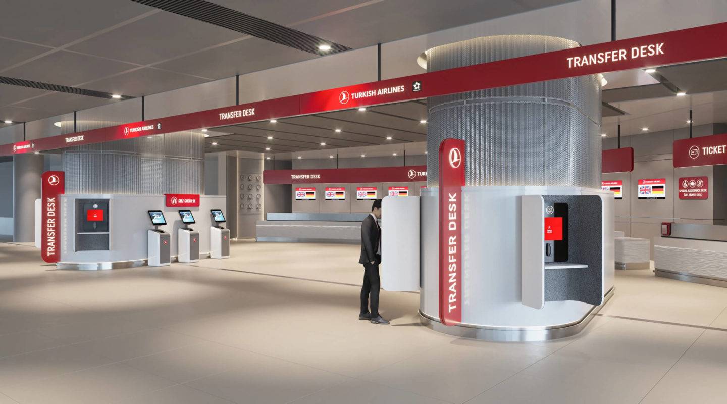 Large Turkish Airlines transfer desk at New Istanbul Airport, with customer service desks as well as self-service kiosks