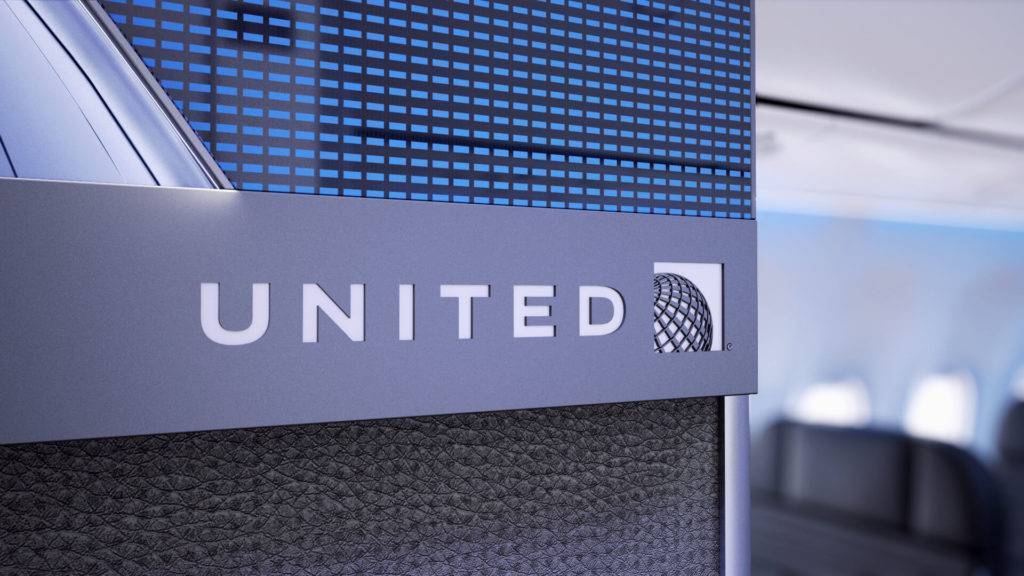 Detail of the United logo within the aircraft cabin interior