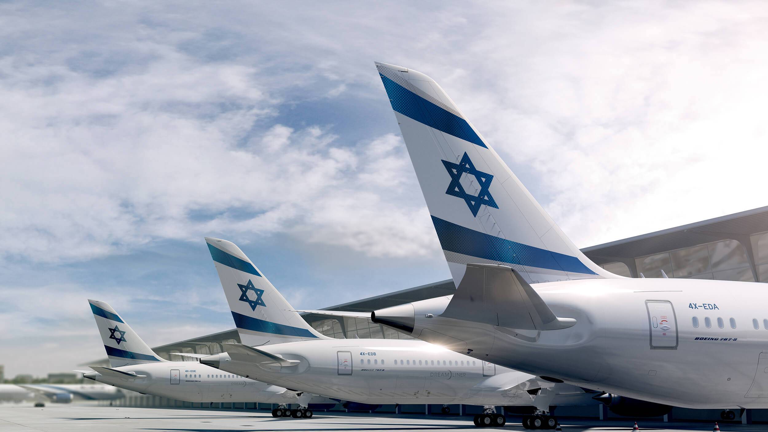 Three aircraft lined up at an airport terminal showcasing the El Al livery on the aircraft tail fins