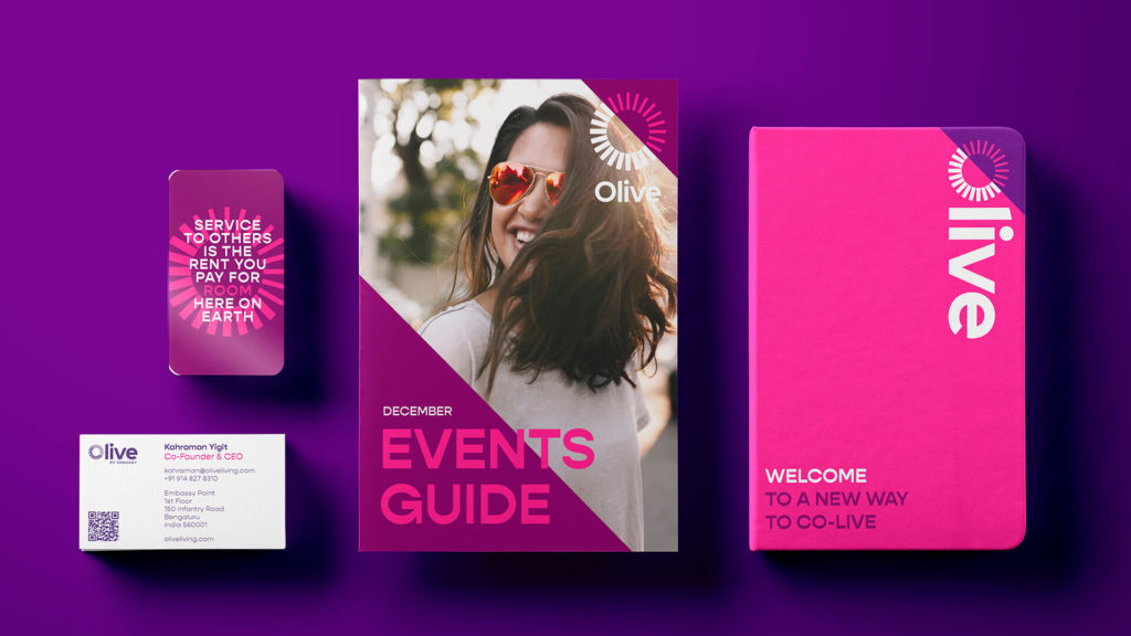 Printed materials in different sizes showcasing the new Olive brand including business cards and events guide