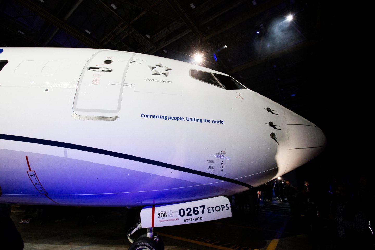 Connecting people uniting the world. The nose of a United Airlines aircraft