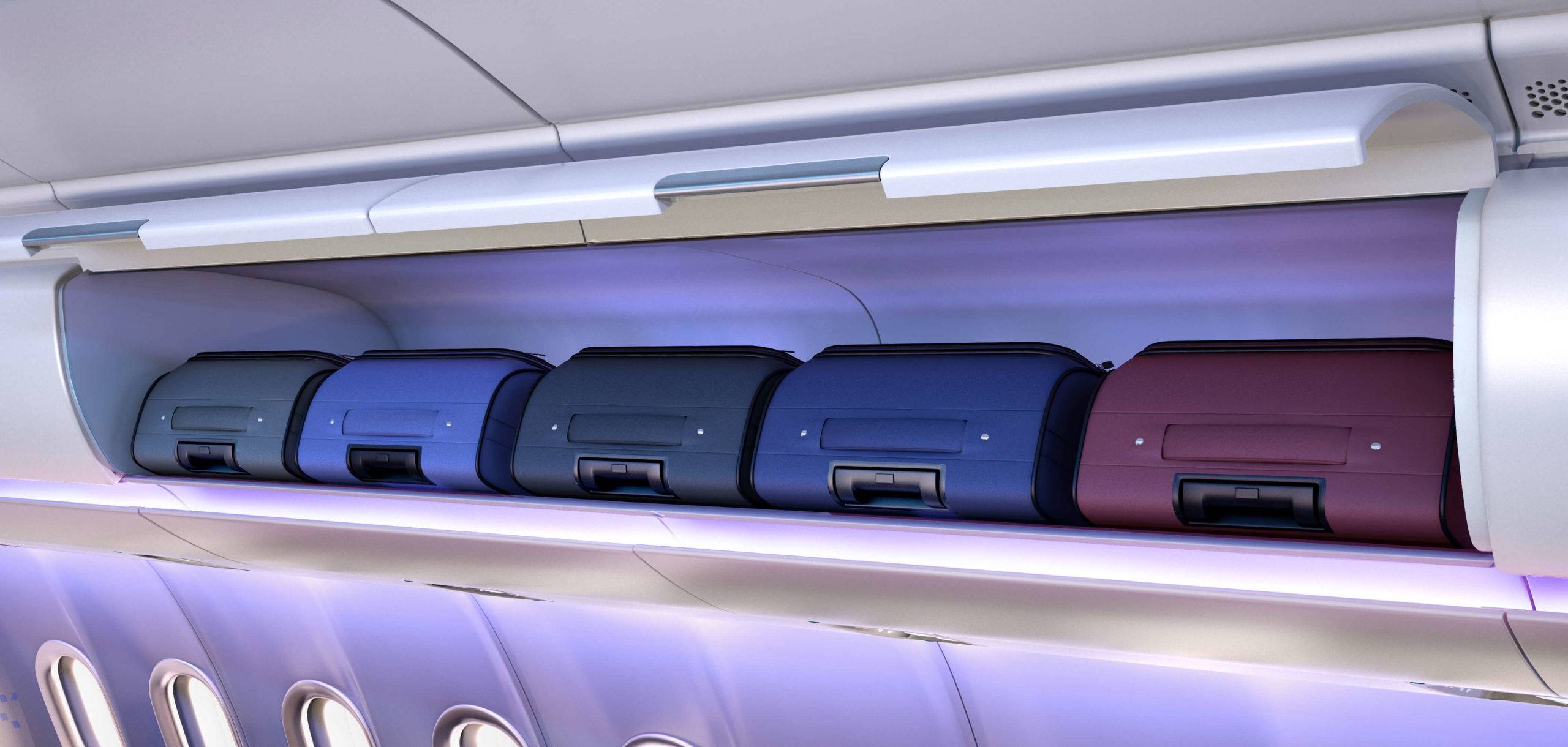 Carry on luggage neatly stowed in an overhead bin on the Airbus Airspace A330