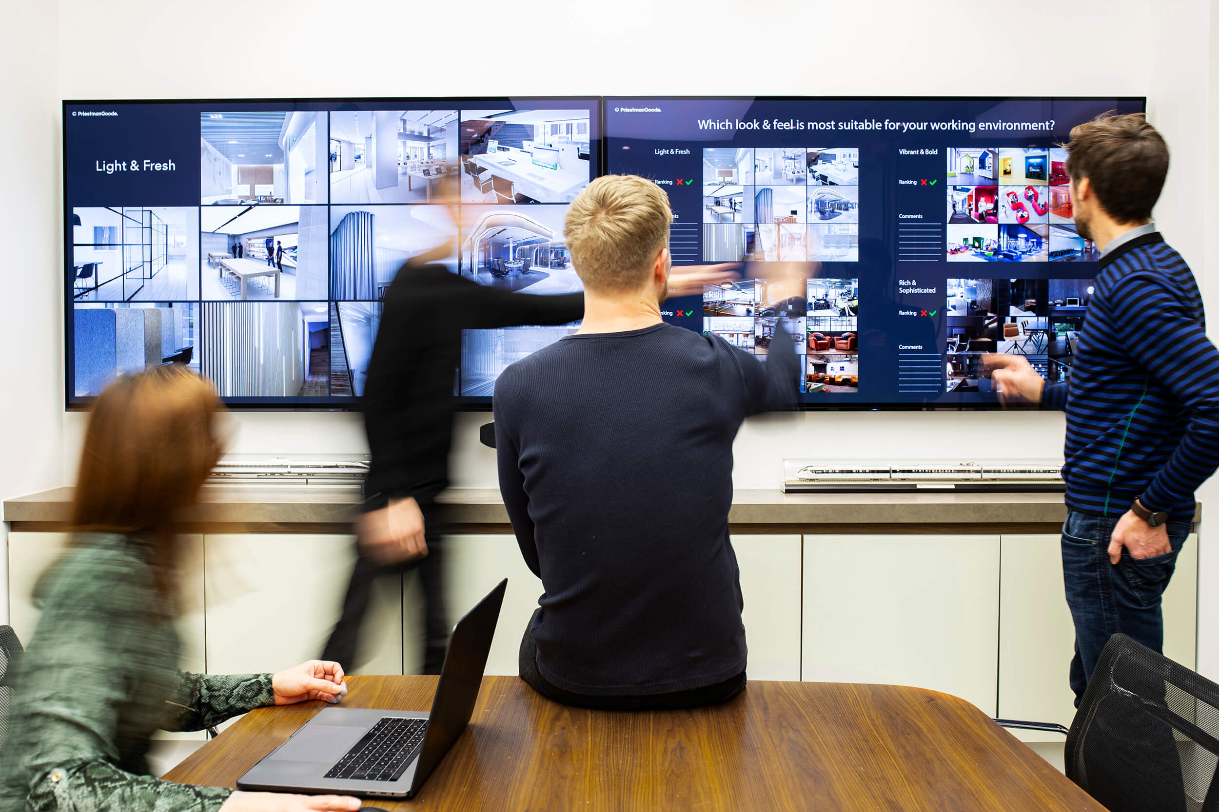 A group of people in a meeting