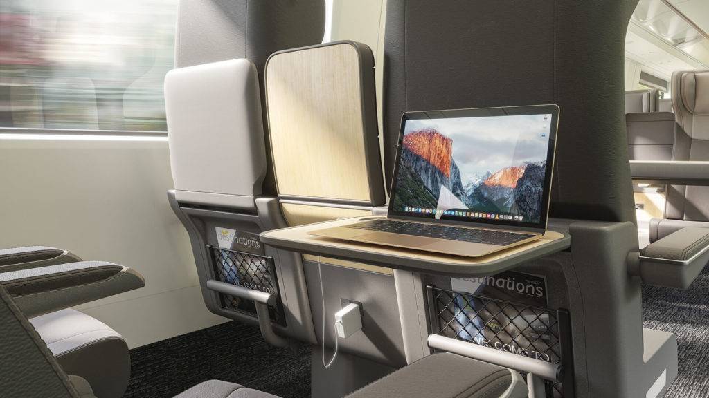 Rear view of VIA rail's Business Class seats with fold down table