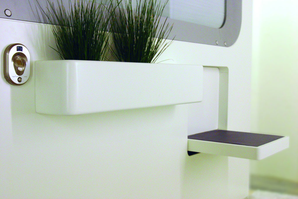 A seat flips down from a wall, a wall mounted planter with two plans