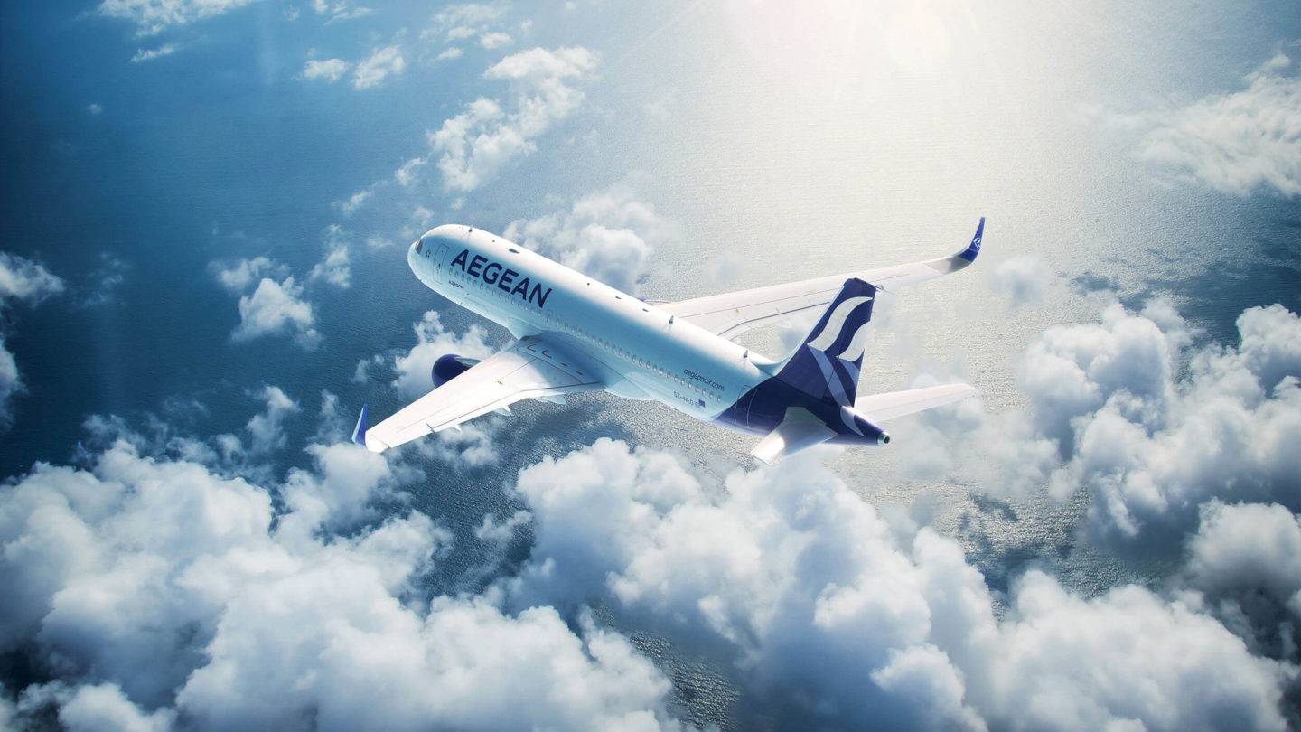 Aegean AIrlines Neo aircraft flying above some clouds