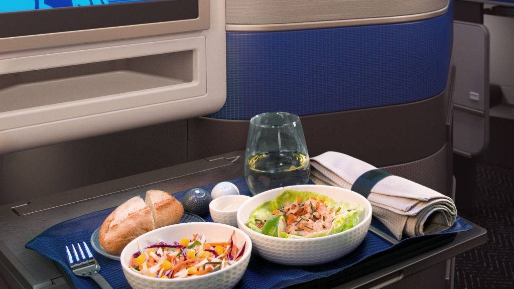 United Airlines Polaris Business Class meal service tray and crockery