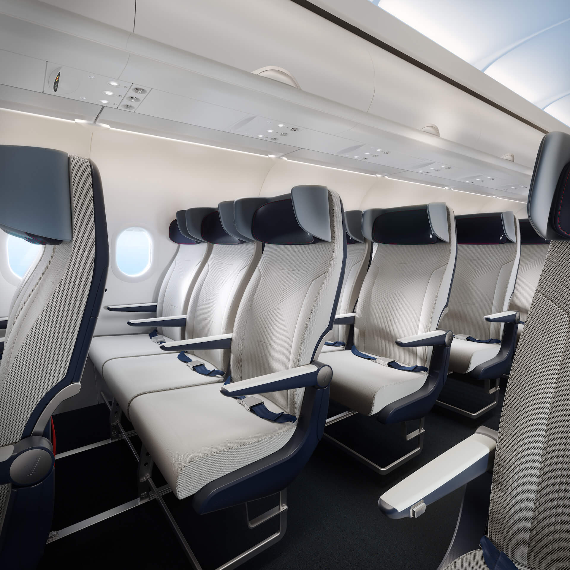 Side view of a row of economy class seats in contemporary light grey fabric with dark blue headrests with special privacy wings