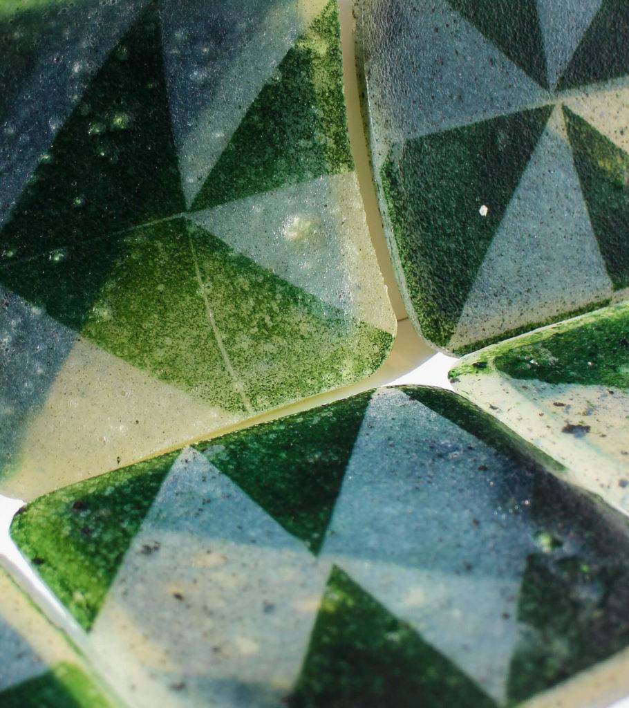 Detail of green geometric patterned tiles