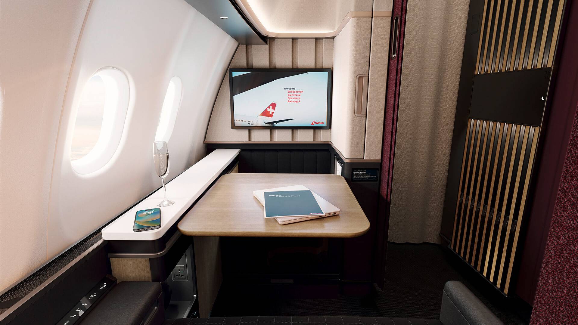 Forward facing view aboard the SWISS A330 First Class suite with the table down