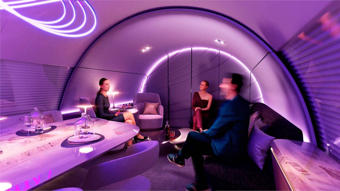 Onboard aircraft private dining experience with purple ambient lighting