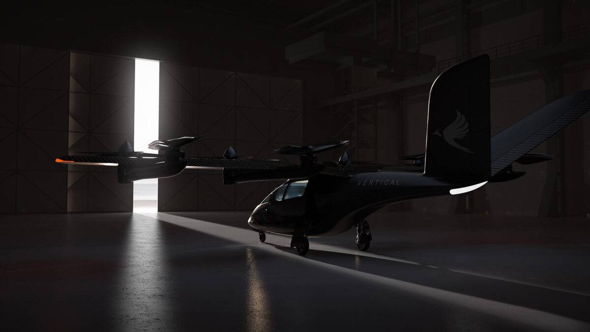 eVTOL Vertical in an aircraft hanger with light shining through the door